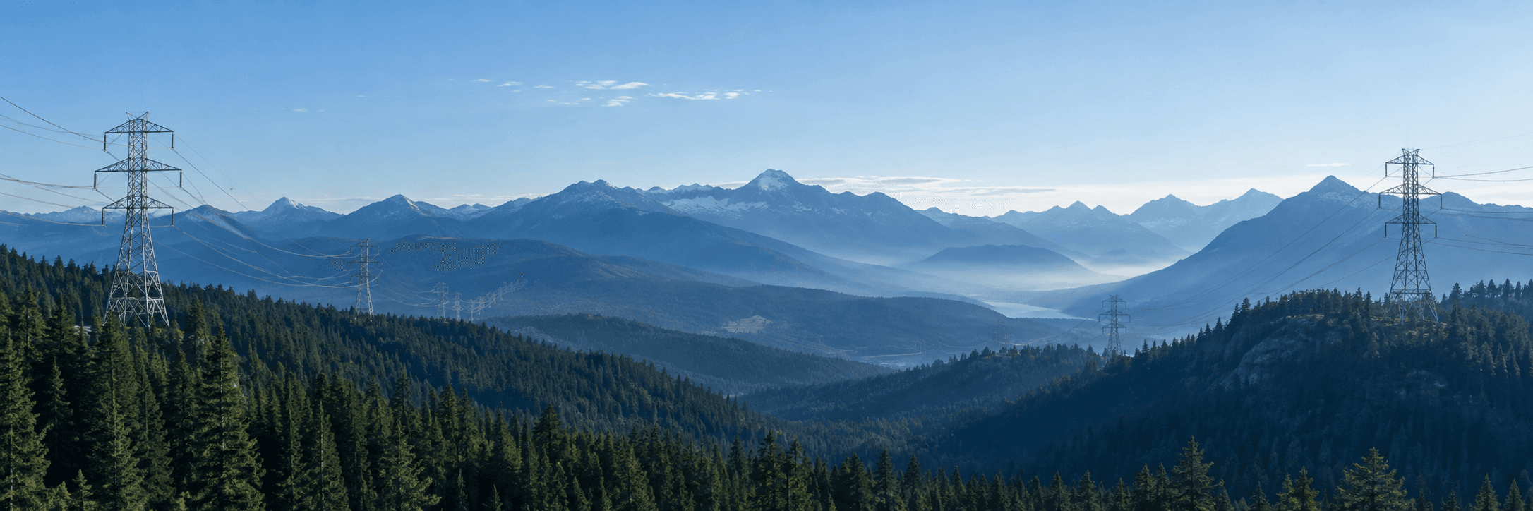 Transmission lines crossing a mountain landscape